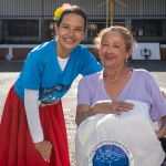 Rostro feliz de nuestra beneficiada en el evento.