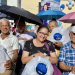 Rostros felices de nuestros beneficiados en el evento.