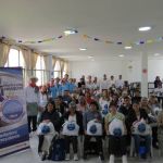 Foto general del evento con voluntarios, beneficiarios y acompañantes