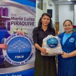 Entrega de beneficios Personas reciben beneficios de la fundación con acompañamiento de los voluntarios.